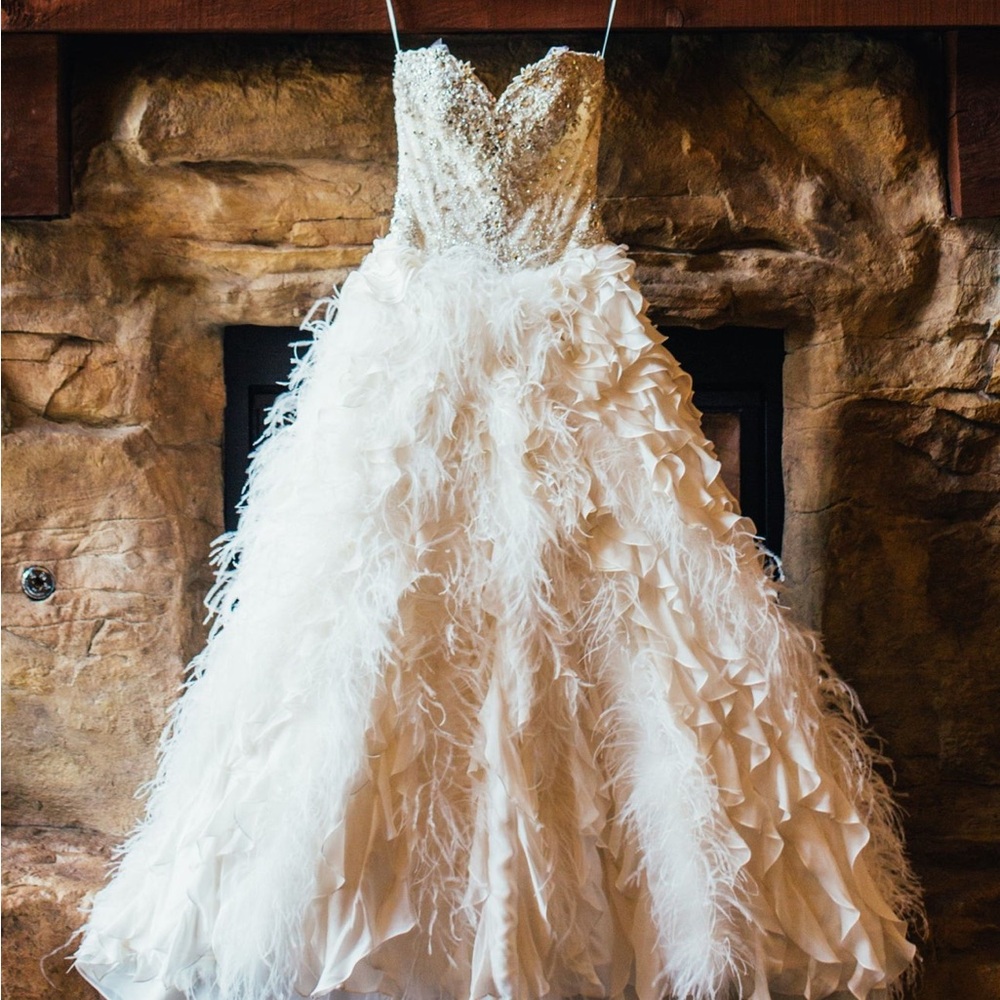 Elegant White Feathered Wedding Gown